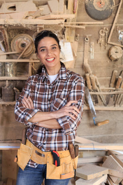 istock Cheerful female carpenter 912550400