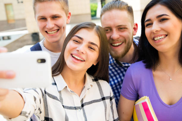 istock Students taking photo of themselves 912550720