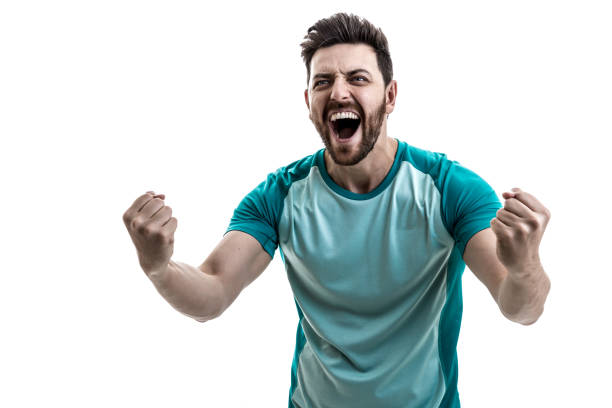 istock Fan / Sport Player on green uniform celebrating 912552202