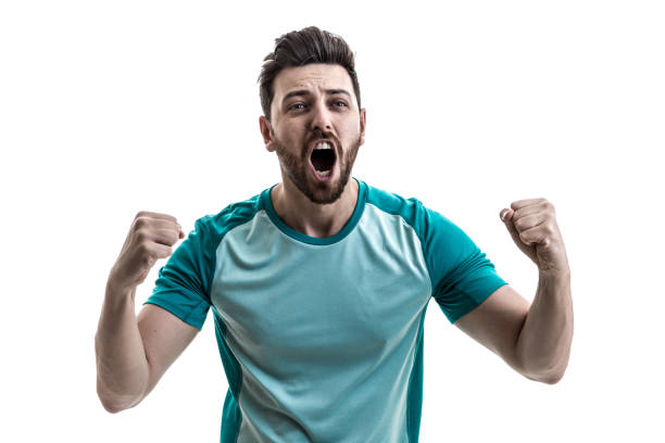 istock Fan / Sport Player on green uniform celebrating 912552218