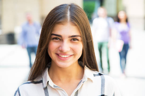 istock Female students outdoors with her friends 912552302