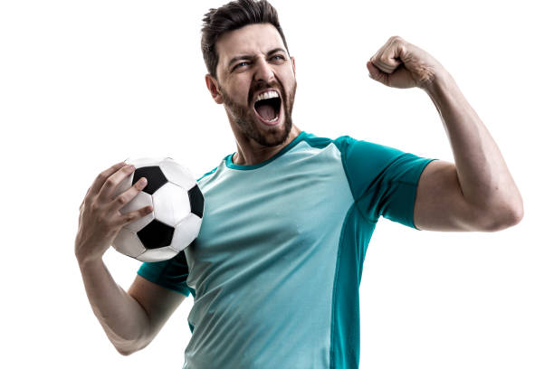 istock Fan / Sport Player on green uniform celebrating 912552322