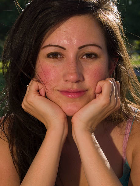 Young Woman in the park  rosy cheeks stock pictures, royalty-free photos & images