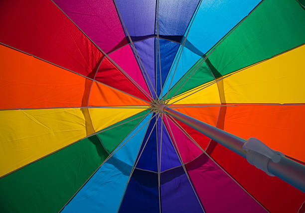 view under colorful umbrella stock photo