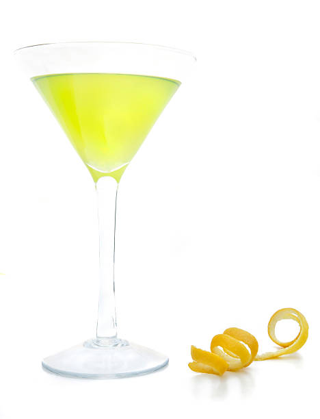 Martini glass of limoncello with twist of lemon peel  stock photo