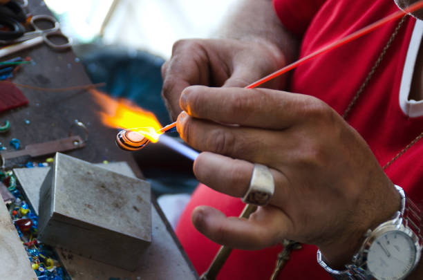 istock Glass Blowing Factory 912575148
