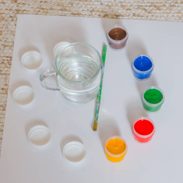 istock paint and brush on paper, background 912584516