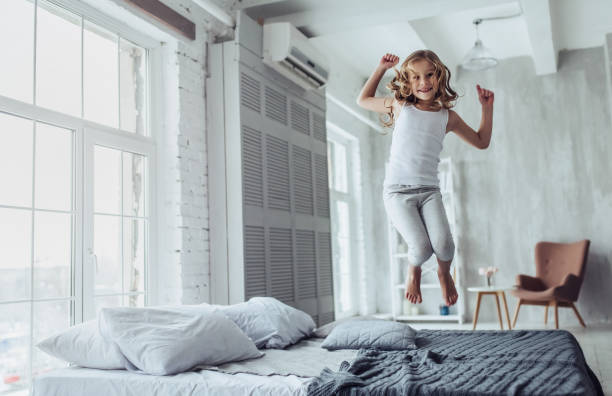 istock Cute little girl at home 912585048