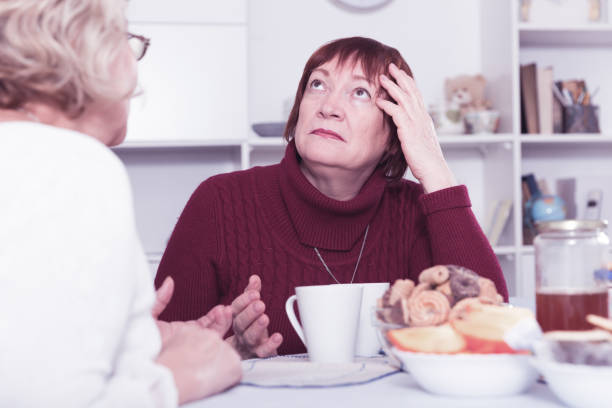istock Old women in the kitchen quarrel 912585516