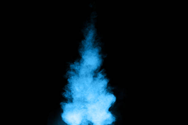 istock Abstract blue dust explosion on  black background. Blue powder splattered on black background. Freeze motion of blue powder splash. 912599580
