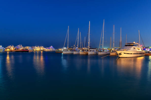 istock luxury yachts in the bay at night 912607602