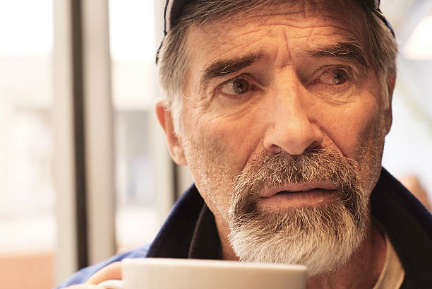 istock close up of senior man looking pensive 91261029