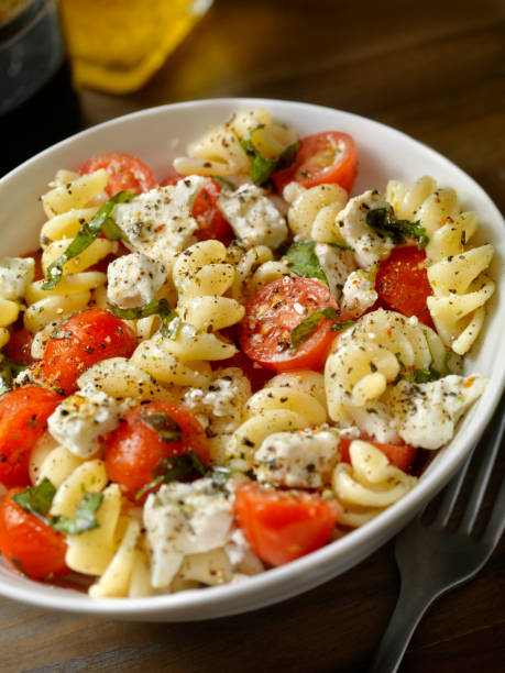istock Tomato and Feta, Pasta Salad with Freshly Chopped Basil 912610676