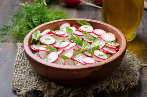 Photo of Fresh vegetable salad with radish