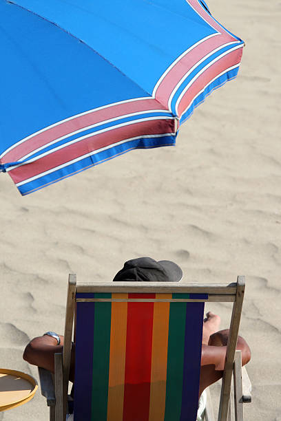 istock Man sunbathing on an Italian beach 91261439
