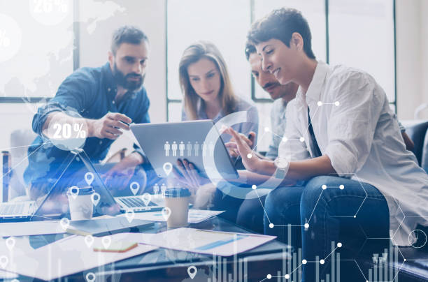 istock Concept of digital diagram,graph interfaces,virtual screen,connections icon on blurred background.Coworking team at business meeting.Group of colleagues working with startup project in modern office. 912617488
