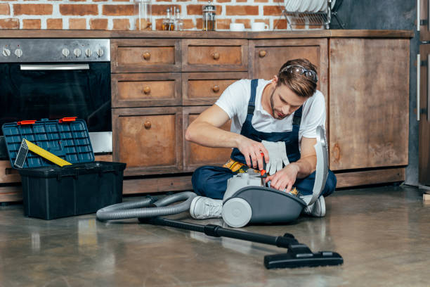 istock professional repairman fixing vacuum cleaner 912617960