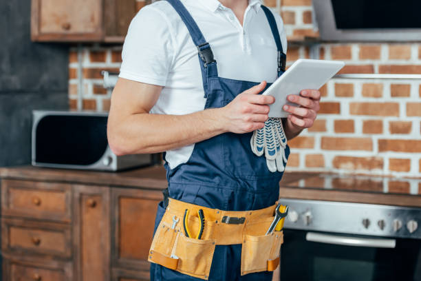 istock cropped shot of professional home master using digital tablet 912620654