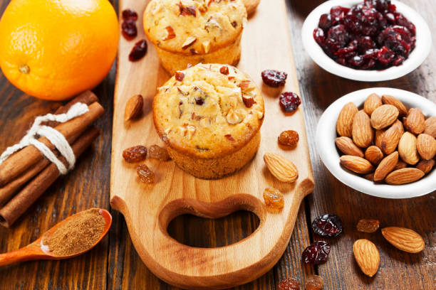 istock Orange muffins with dried fruits 912620746