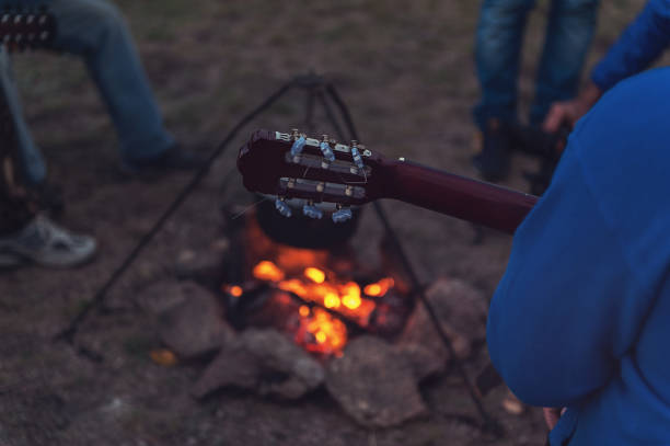 istock guitar near the campfire 912620760