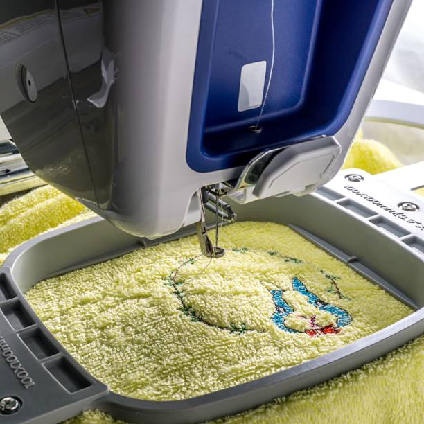 istock Close up picture of workspace embroidery machine 912620894