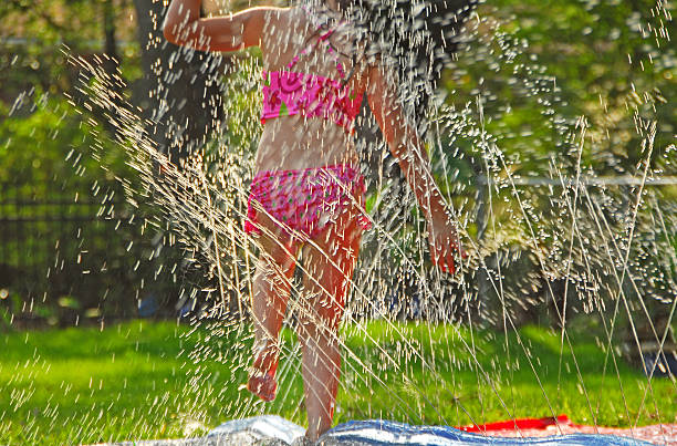 istock Girl in Water Spray 91262570