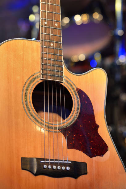 istock Guitar and other musical equipment on stage before concert 912628302