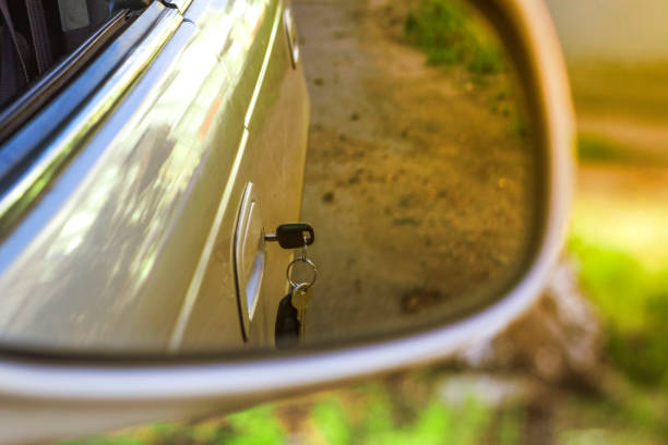 istock forgotten car keys in the rearview mirror, the front and back are blurred with the bokeh effect 912636962
