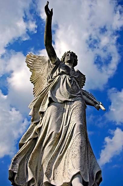 istock angelic victory statue on the sky background 91263944