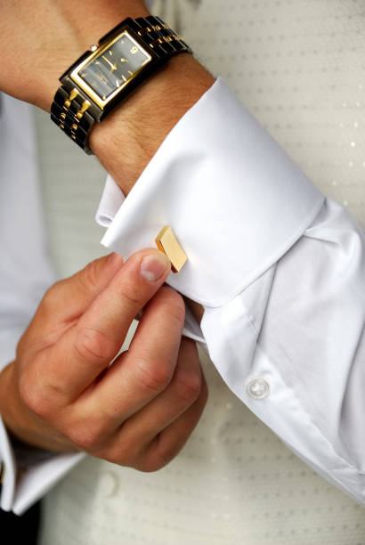 istock a man in wedding suit preparing his look 912644478