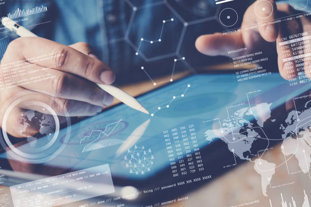 istock Concept of digital diagram,graph interfaces,virtual display,connections icon.Businessman working contemporary electronic tablet at office.Blurred background. Horizontal. 912645844
