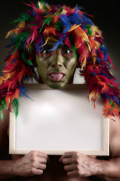 Shaman Message colorful shaman with blank sign shaman humor individuality men stock pictures, royalty-free photos & images