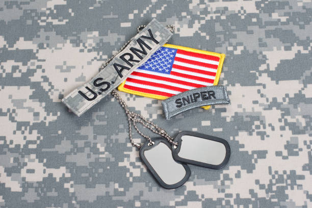 istock US ARMY sniper tab with blank dog tags on camouflage uniform 912648878