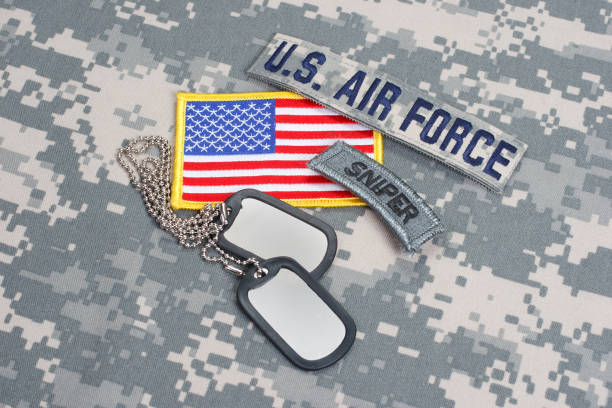 istock US AIR FORCE sniper tab with blank dog tags on camouflage uniform 912649070