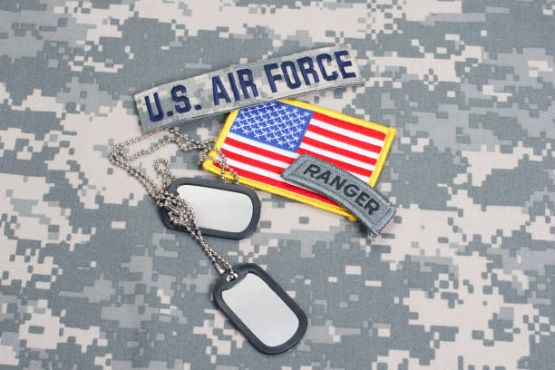 istock US AIR FORCE ranger tab with blank dog tags on camouflage uniform 912649572