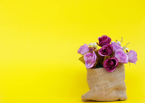istock Flower Pot on yellow background.Happy weekend concept. 912650050