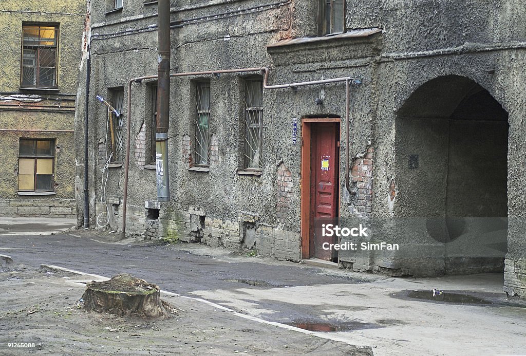 Old building and arch in back alley  Abandoned Stock Photo