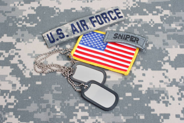 istock US AIR FORCE sniper tab with blank dog tags on camouflage uniform 912653132