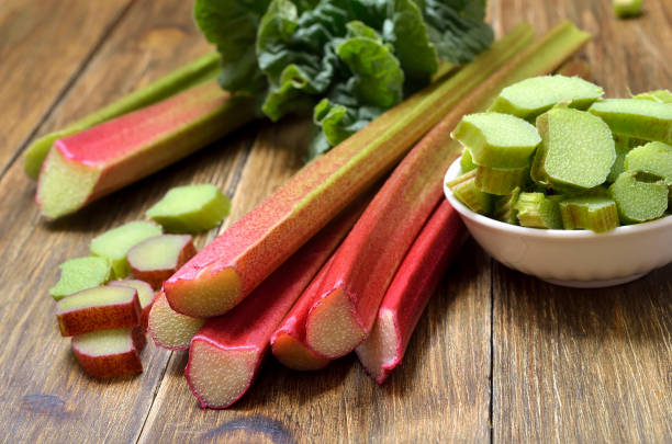 istock Rhubarb on wooden table 912658270