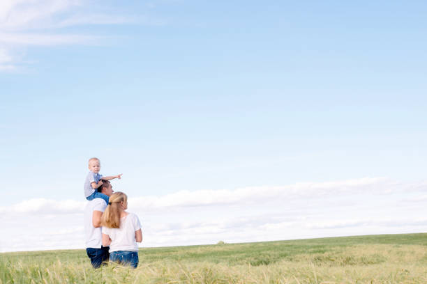 istock parents with the child walk 912658308