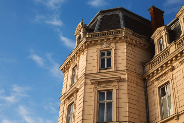 istock European architectural building on the sky background 912663414