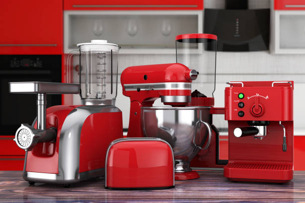 Kitchen Appliances Set. Red Blender, Toaster, Coffee Machine, Meat Ginder, Food Mixer and Coffee Grinder. 3d Rendering Kitchen Appliances Set. Red Blender, Toaster, Coffee Machine, Meat Ginder, Food Mixer and Coffee Grinder on a wooden table. 3d Rendering toaster appliance stock pictures, royalty-free photos & images