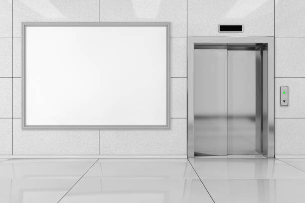 istock Blank Ad Billboard or Poster near Modern Elevator or Lift with Metal Doors in Office Building. 3d Rendering 912666284
