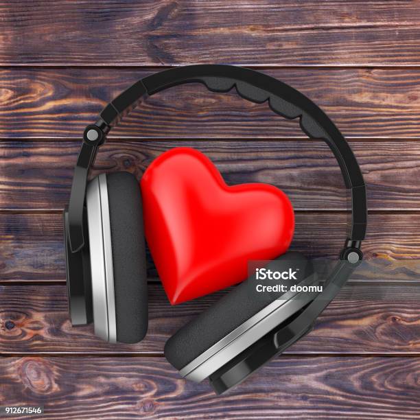 Concepto De La Música Del Amor Negro Auriculares Inalámbricos Y Un Corazón  Rojo Render 3d Foto de stock y más banco de imágenes de Accesorio personal  - iStock