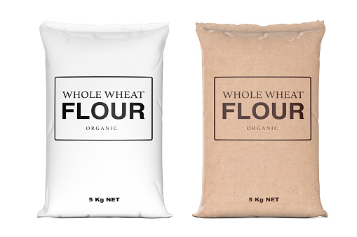 Paper Bags of Whole Wheat Organic Flour on a white background. 3d Rendering