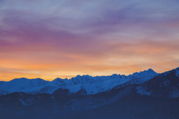 istock Sunrise over snow Tatry mountains in winter time. 912673828