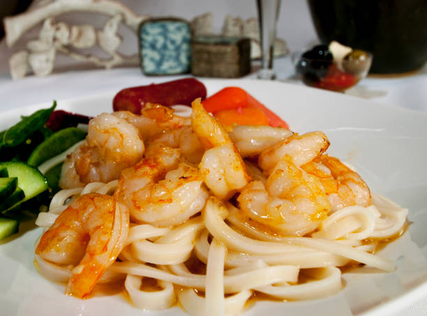 istock Shrimp on Udon Noodles close-up 912681672