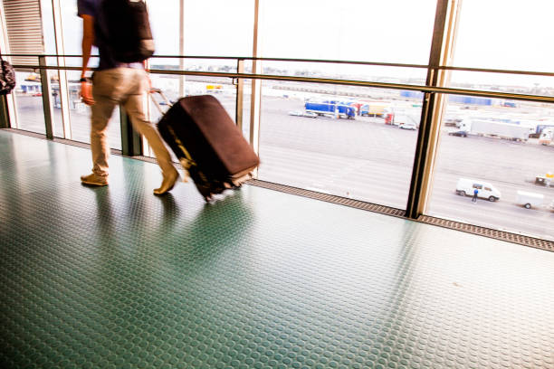 istock Man at the airport with luggage 912683214