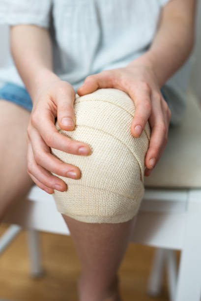 istock Child knee with elastic bandage on it. 912686616