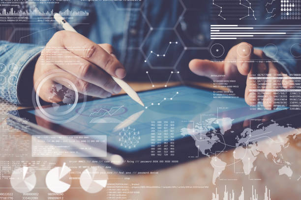 Concept of digital diagram,graph interfaces,virtual display,connections icon.Man using stylus pencil on display of contemporary electronic tablet.Blurred background. Horizontal.